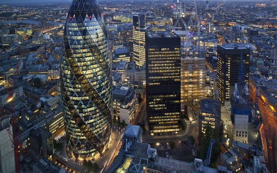 Beautiful view of the city skyline of London at night. Concept of financial translation service.