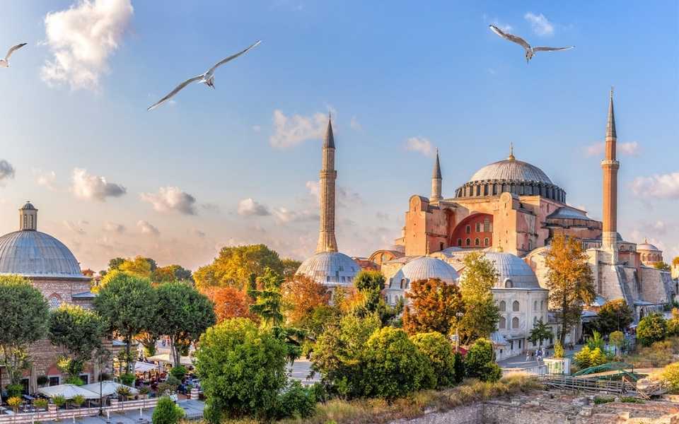 A picture of the sunset and Hagia Sophia Mosque in Istanbul, Turkey. Concept of Turkish translation.