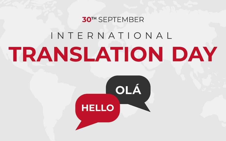 World map shaded in grey with "International Translation Day" written on it. Professional translators celebrate this day and translate into their mother tongues.