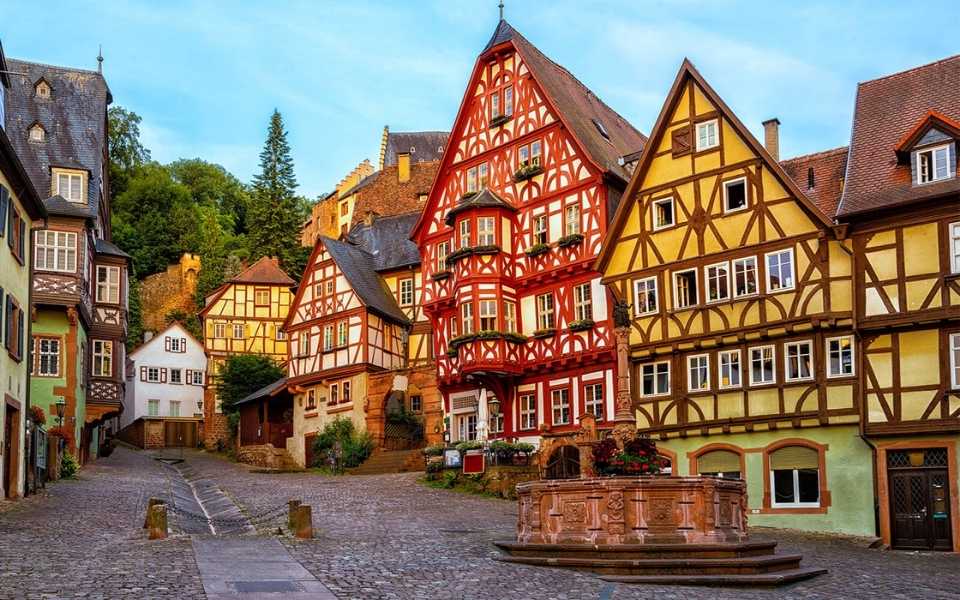 Colourful and wooden houses in an old historical city in Germany. Concept of German translation services.