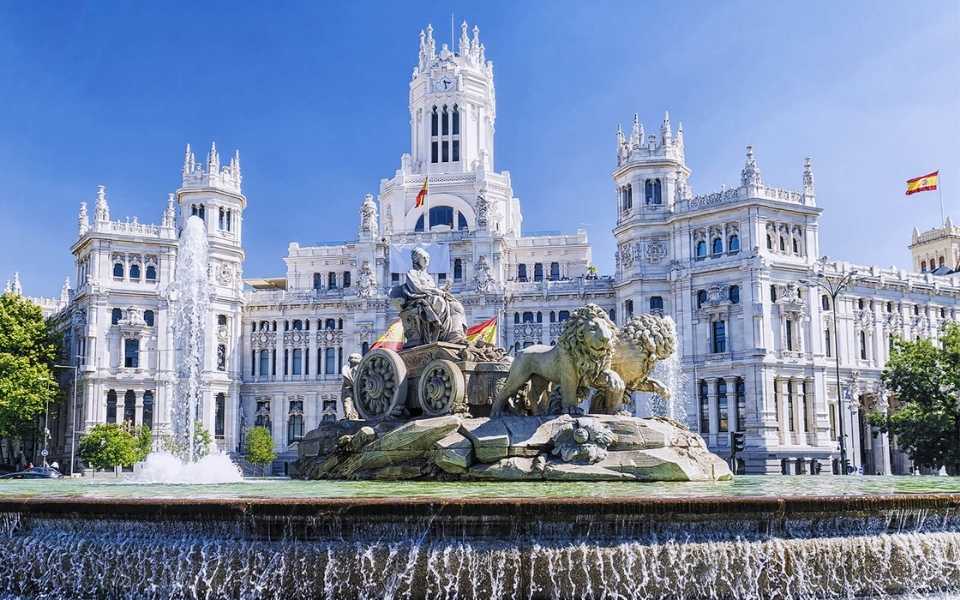 A picture of the Cibeles Fountain in Madrid, Spain, by day. Concept of legal Spanish translations.