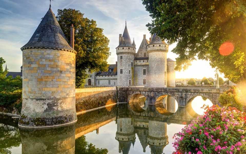 Castle Château de Sully-sur-Loire in France. Concept of translations to French.