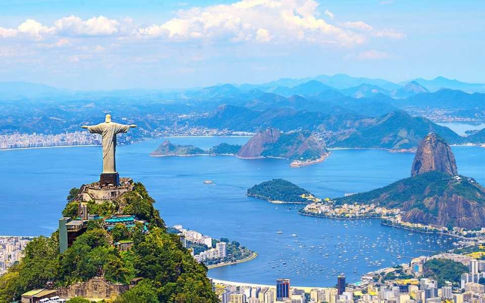 A picture of the flag of Brazil and the flag of Portugal. Concept of Brazilian Portuguese.