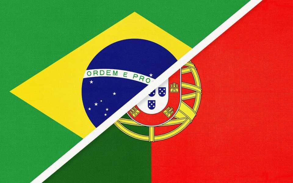 A picture of the flag of Brazil and the flag of Portugal. Concept of the Portuguese language in Portugal and Brazil.