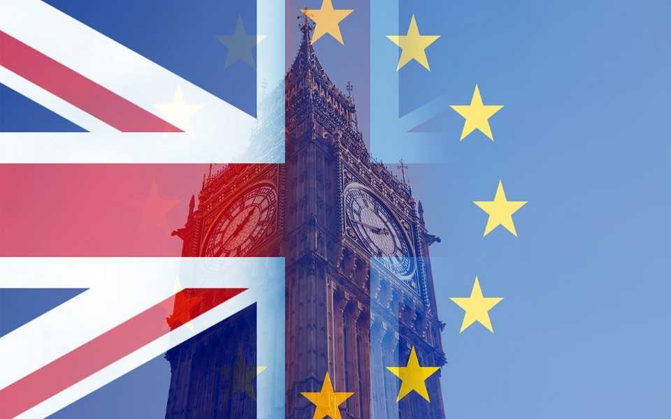 Silhouette of United Kingdom flag and European Union flag over Big Ben. Concept of language translation services market after Brexit.