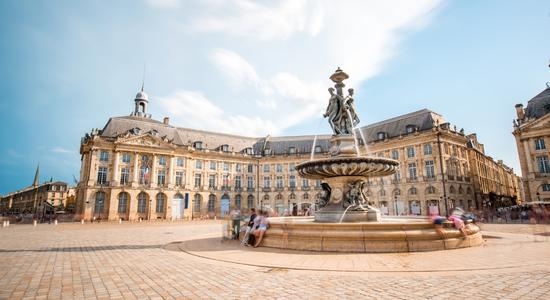 View of La Bourse square and fountain in Bordeaux, France.