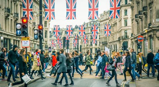 People crossing the road in Oxford circus in London.