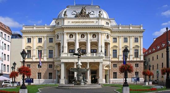 The Slovak National Theater, a 19th century Neo-Renaissance building in Bratislava. Concept of technical Slovak translation.