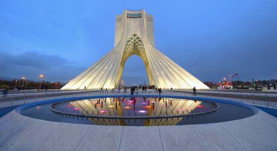 The Azadi Tower, a white marble monument in Tehran, Iran. 