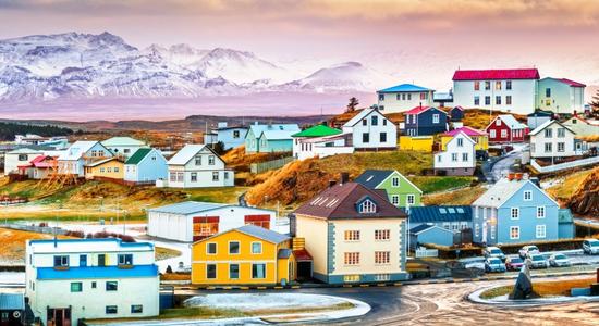 Colorful houses in the town of Stykkisholmur in Iceland. Concept of Icelandic to English translation. 
