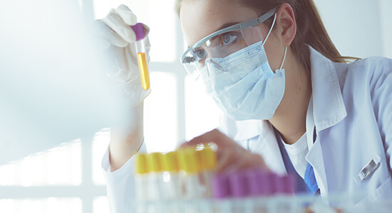 A researcher doctor working in laboratory. 