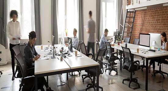 Business team working in an open office. 