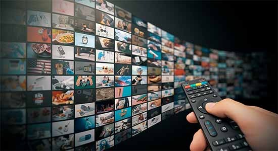 Wall of streaming television channels. Concept of video subtitling services.
