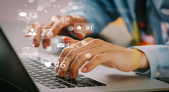 Man hands typing on laptop's keyboard. 