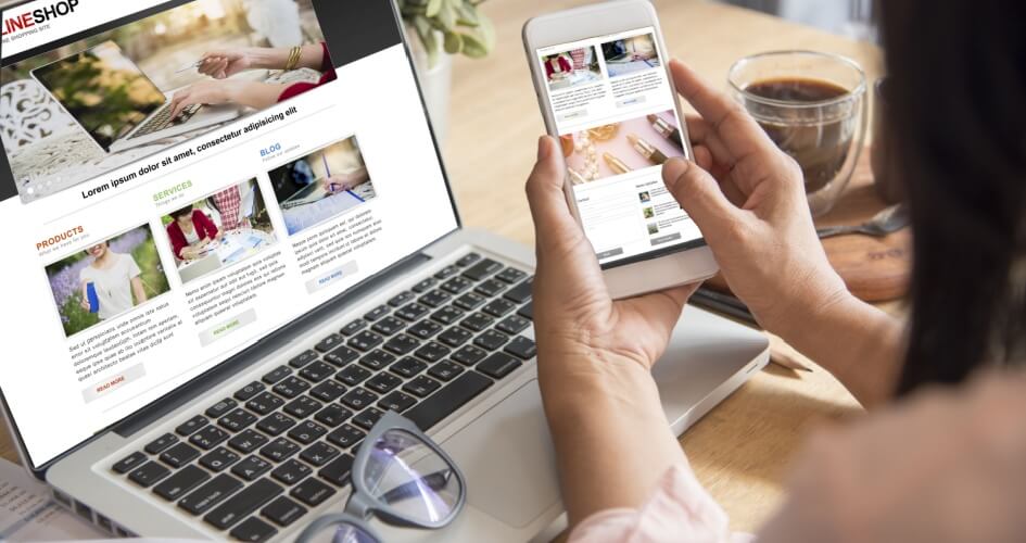 Close-up view of a hand using a mobile phone. A shopping cart on e-commerce sites that allows you to easily make purchases using your smartphone, iPhone, iPad or laptop. A Concept of app localisation services.