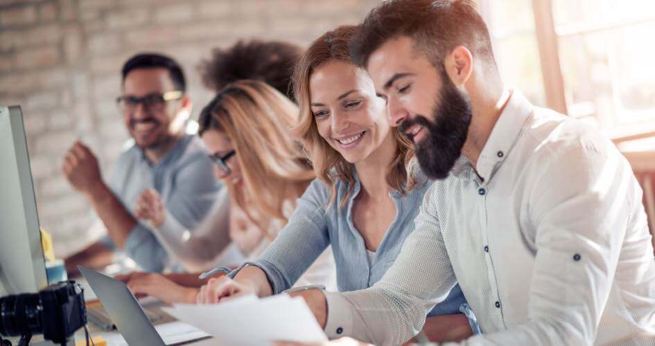 Businesspeople working together in the office. A concept of professional translation services.